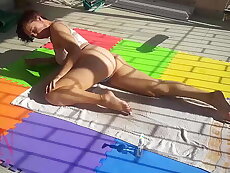 An attractive lady is sunbathing on the roof of her house. Nude yoga TEASER 1
